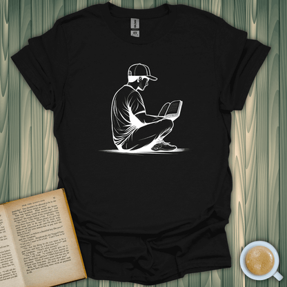 Reading in Serenity T-Shirt featuring a book lover enjoying a good read, designed for comfort in 100% cotton.