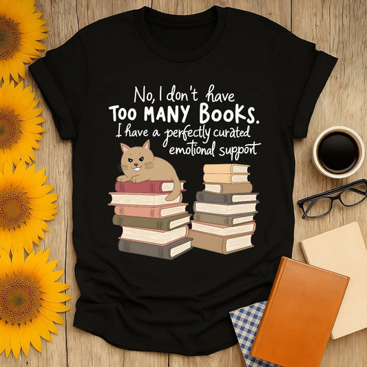 Emotional support books t-shirt design featuring a cat and stacked books, perfect for book lovers.