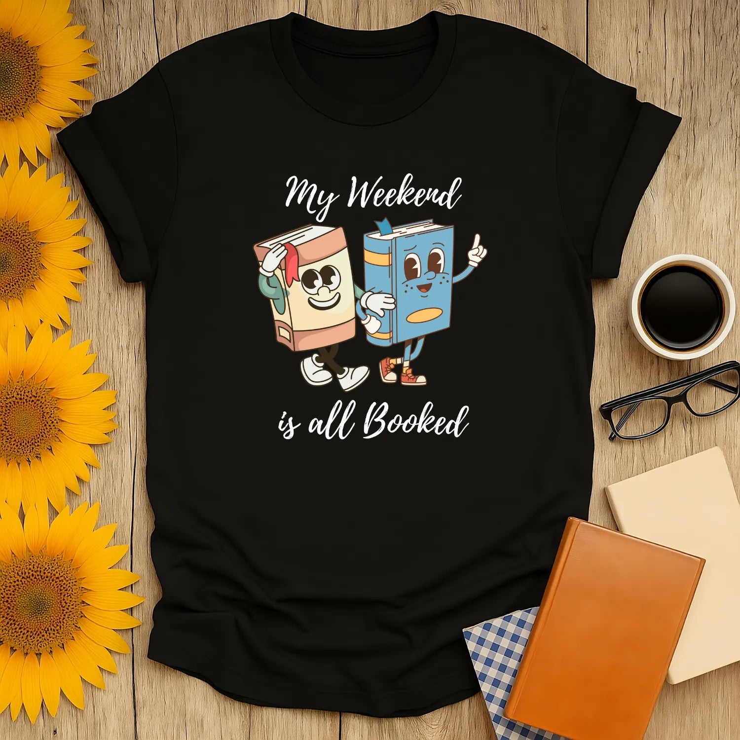 Funny book lover shirt featuring cheerful cartoon books with the phrase 'My Weekend is all Booked', perfect for cozy reading days.