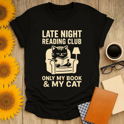 Funny Late Night Reading Club t-shirt featuring a cozy cat reading, perfect gift for book lovers and cat enthusiasts.