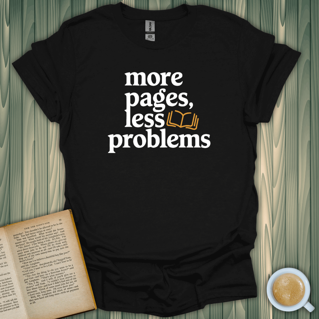 Black t-shirt reading 'more pages, less problems', perfect for book lovers who enjoy comfort and style.