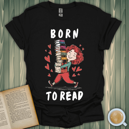 Born to Read T-Shirt for book lovers featuring a cheerful character with stacked books and hearts.