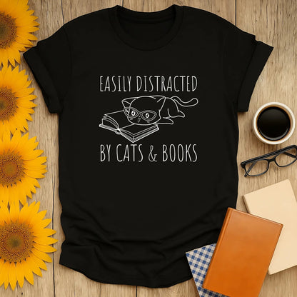 Easily Distracted by Cats & Books shirt with cute cat illustration, perfect gift for book lovers and cat enthusiasts.