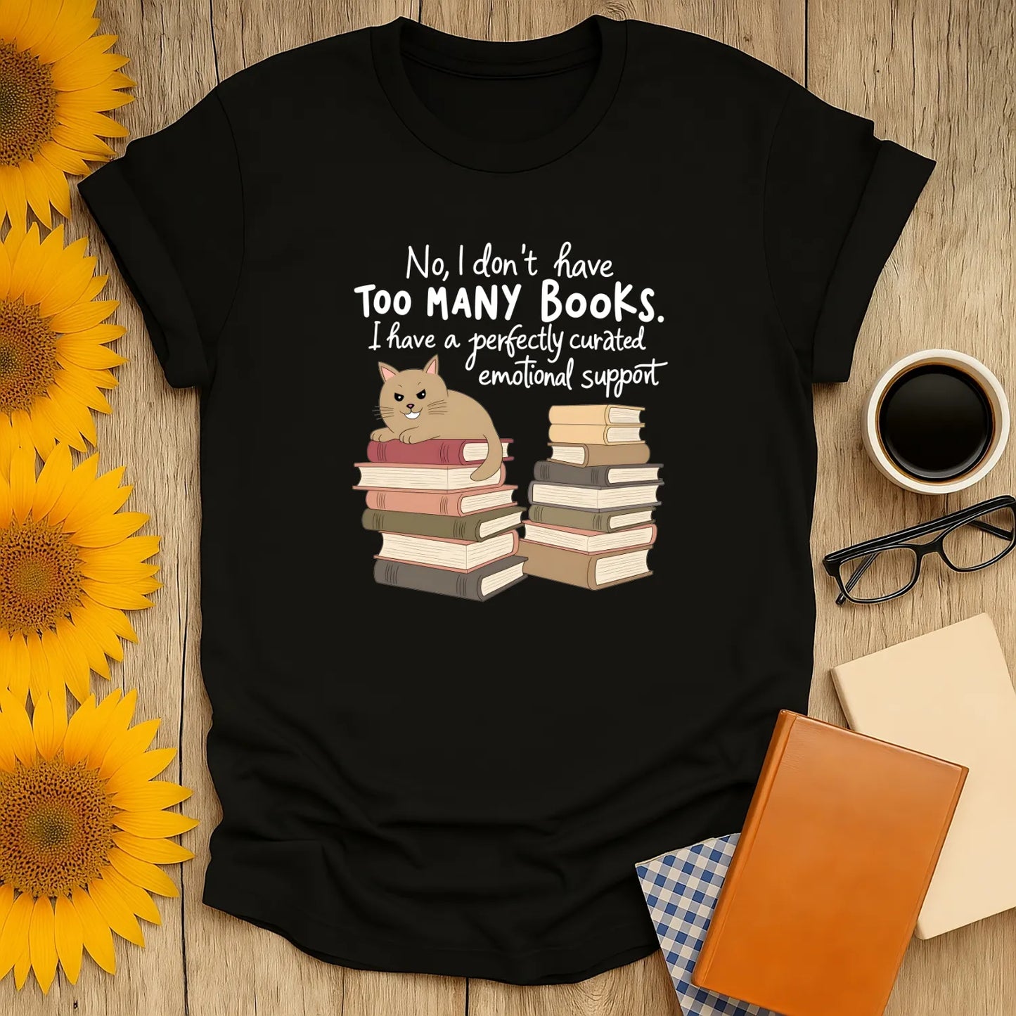 Emotional Support Books T-Shirt featuring a cat and stacks of books. Cozy reading aesthetic, relaxed fit unisex tee for bibliophiles. 📖