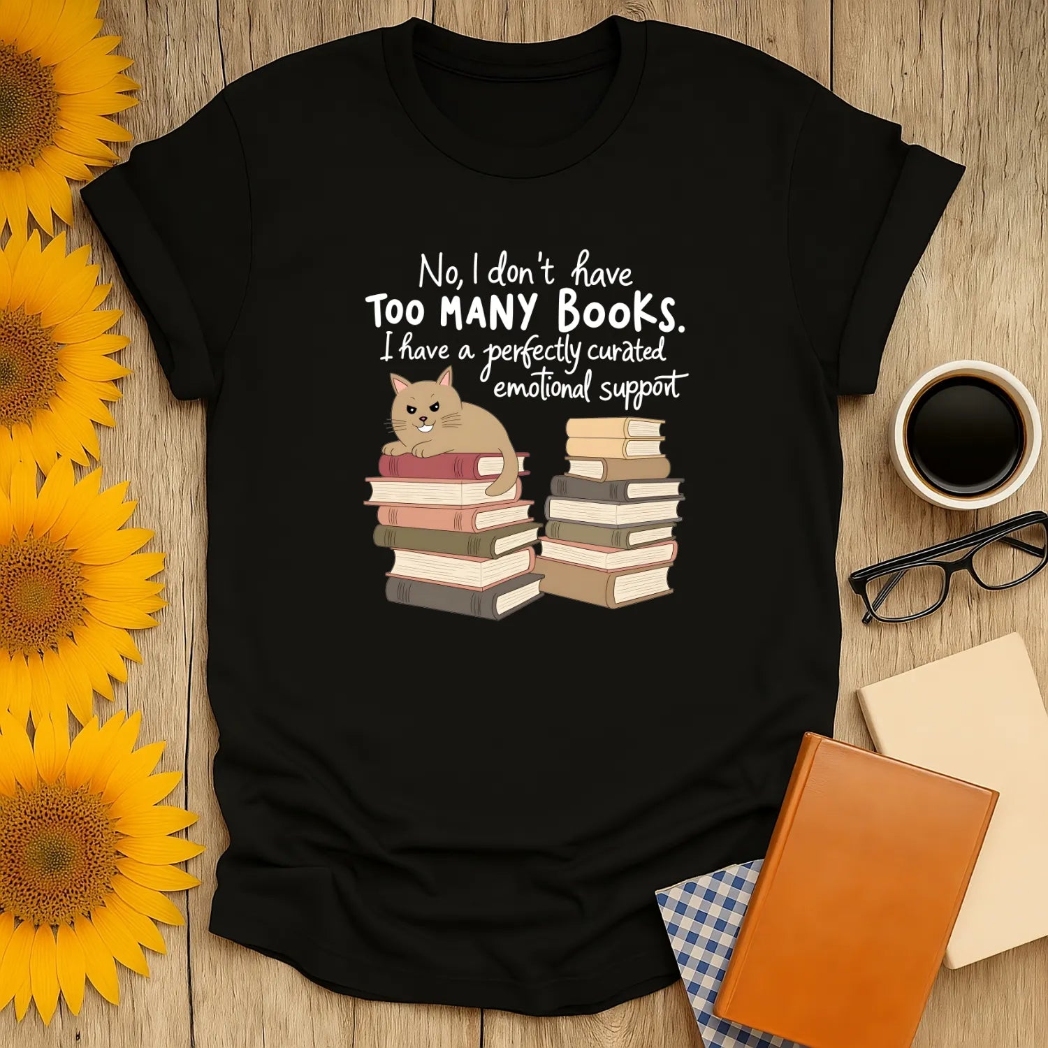 Emotional Support Books T-Shirt featuring a cat and stacks of books. Cozy reading aesthetic, relaxed fit unisex tee for bibliophiles. 📖