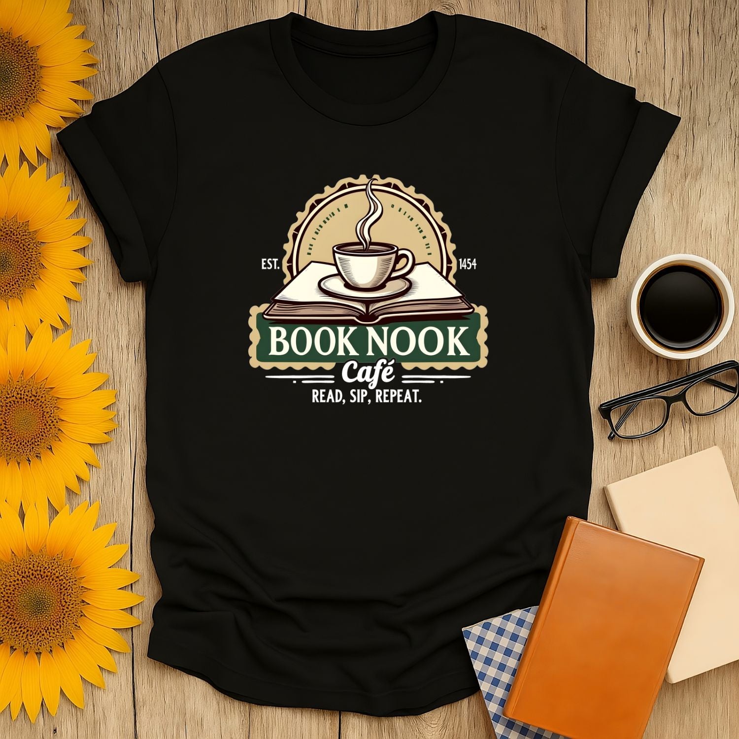 Cozy book lover shirt featuring coffee, a book, and 'Read, Sip, Repeat' for cat lovers and avid readers.