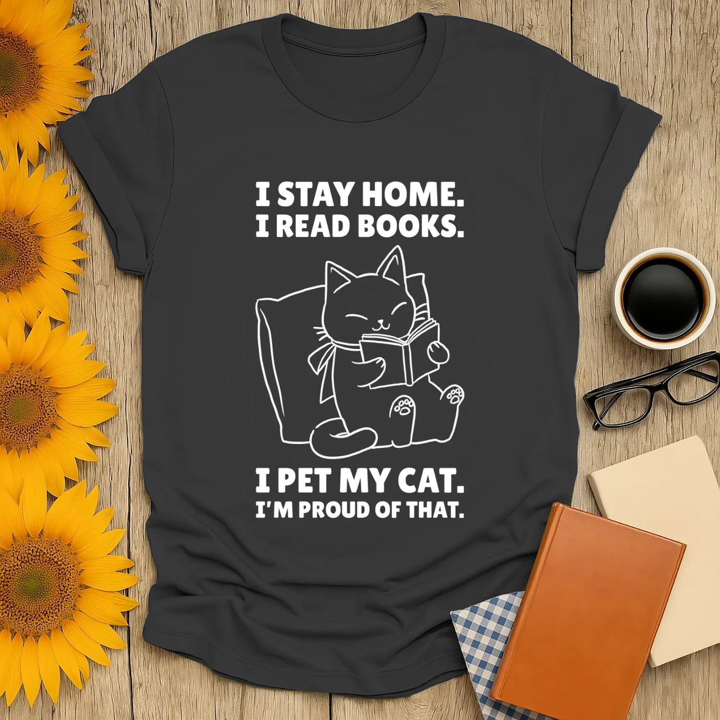 Funny cat reading shirt with text: "I stay home. I read books. I pet my cat. I’m proud of that." Perfect for book lovers!