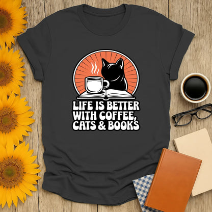 Cozy book lover shirt featuring a cat silhouette, coffee cup, and the phrase 'Life is better with coffee, cats & books'. Perfect gift for readers!
