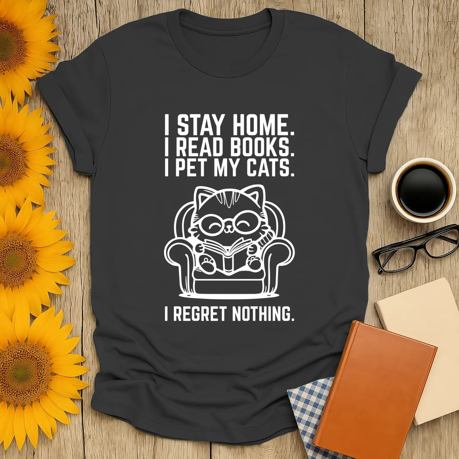 Funny book lover shirt featuring a cat reading in a cozy chair, perfect gift for readers who love cats, coffee, or tea.