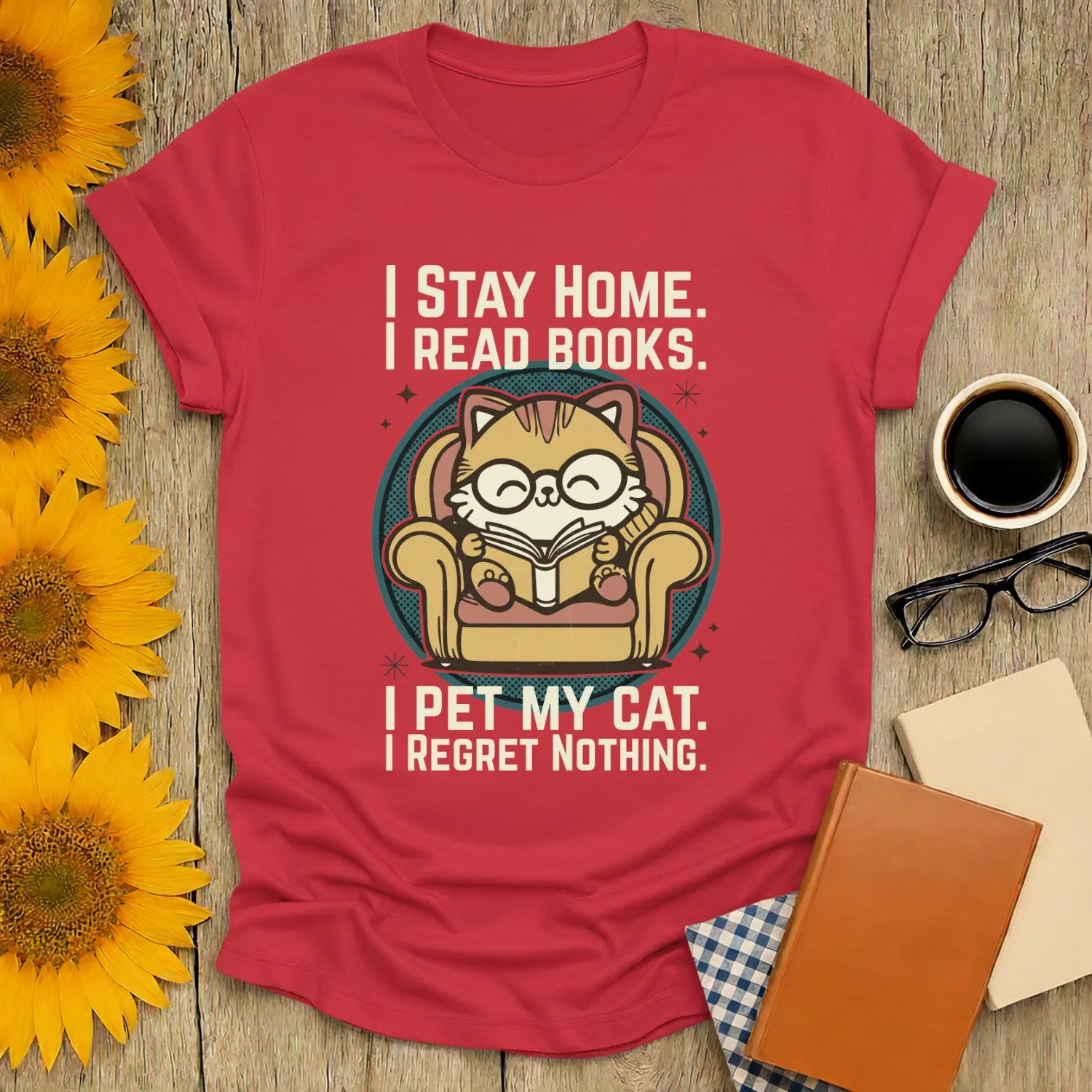 Retro Cat Reader T-Shirt featuring a glasses-wearing cat reading in a cozy armchair with bookish humor text, perfect for cat lovers.
