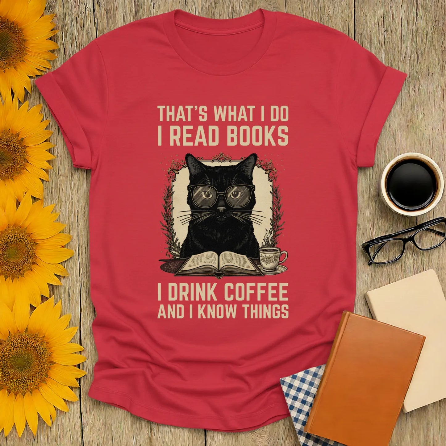 Coffee Cat Reader T-Shirt featuring a black cat in glasses reading with coffee, perfect for book lovers and cozy vibes.