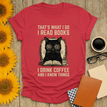 Coffee Cat Reader T-Shirt featuring a black cat in glasses reading with coffee, perfect for book lovers and cozy vibes.
