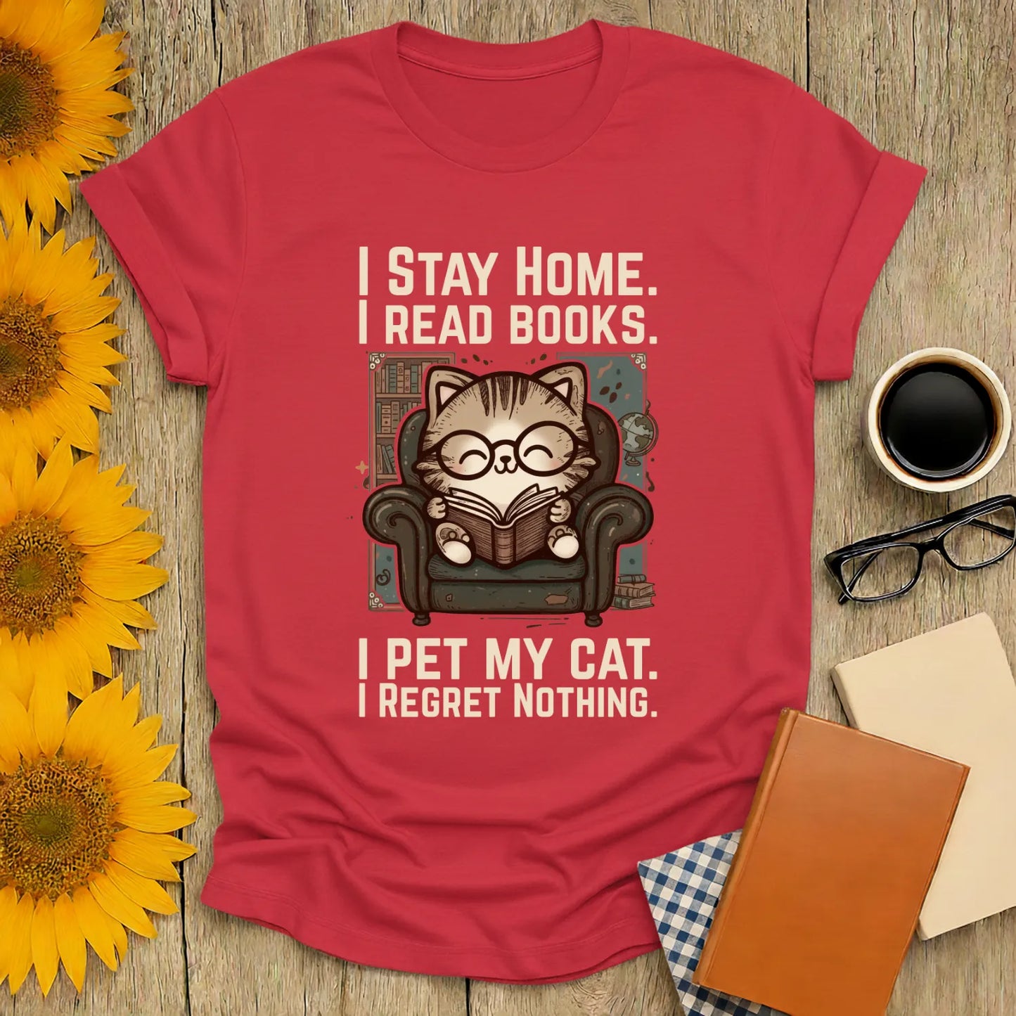 Library Cat Reader T-Shirt featuring a cute cat in glasses reading, with humorous text for book lovers and cat enthusiasts.
