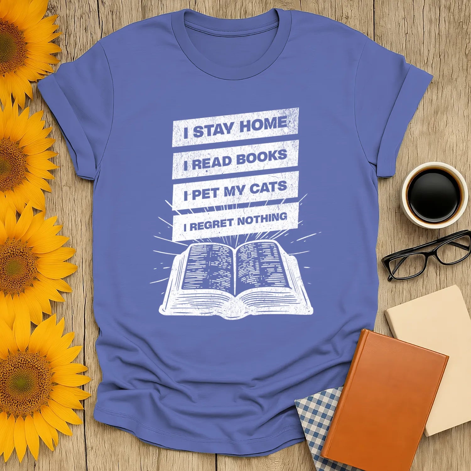 Stay Home Reader T-Shirt with book illustration and text: I Stay Home, I Read Books, I Pet My Cats, I Regret Nothing, perfect for book lovers.