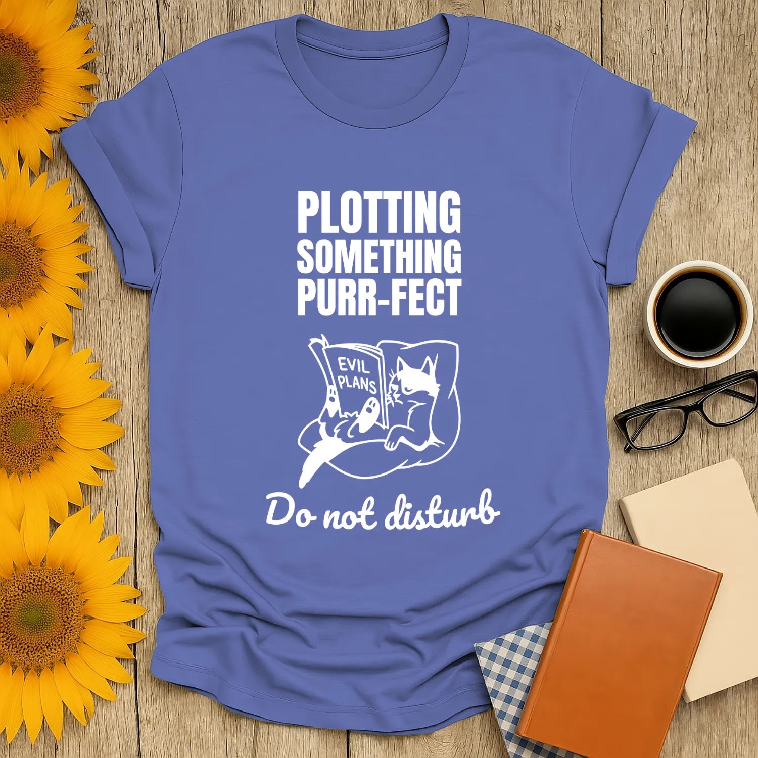 Funny cat reading shirt with text 'Plotting Something Purr-fect' and a kitty holding 'Evil Plans'; perfect gift for book lovers.