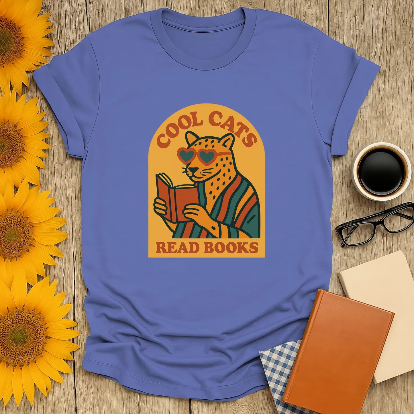 Funny reading tee featuring a stylish cat in shades reading a book, perfect gift for book lovers and cat enthusiasts.