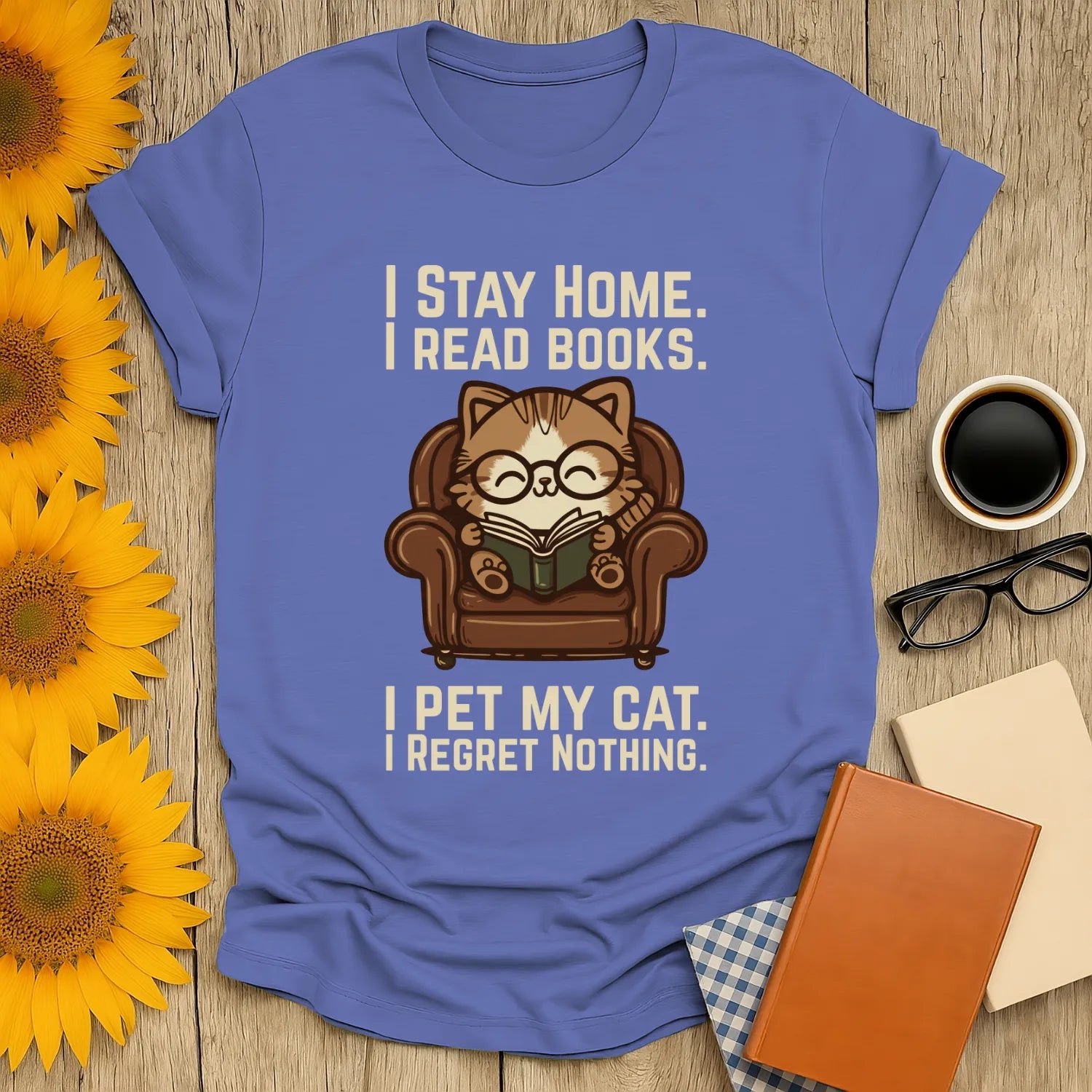 Armchair Cat Reader T-Shirt featuring a cozy cat in glasses reading on a big armchair with humorous text, perfect for book lovers.