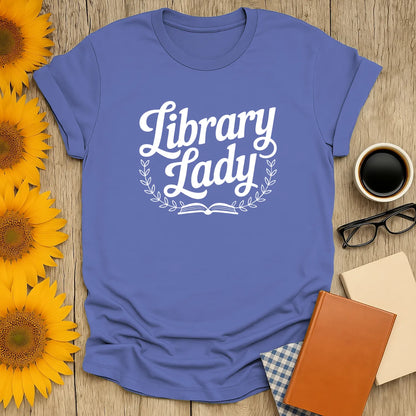 Cozy book lover shirt featuring 'Library Lady' text, perfect gift for readers who adore cats, coffee, or tea.