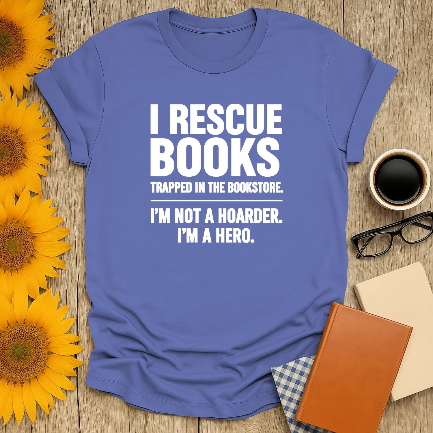 Light blue I Rescue Books t-shirt with witty bookish humor, perfect cozy reading gift for cat, coffee, or tea lovers.