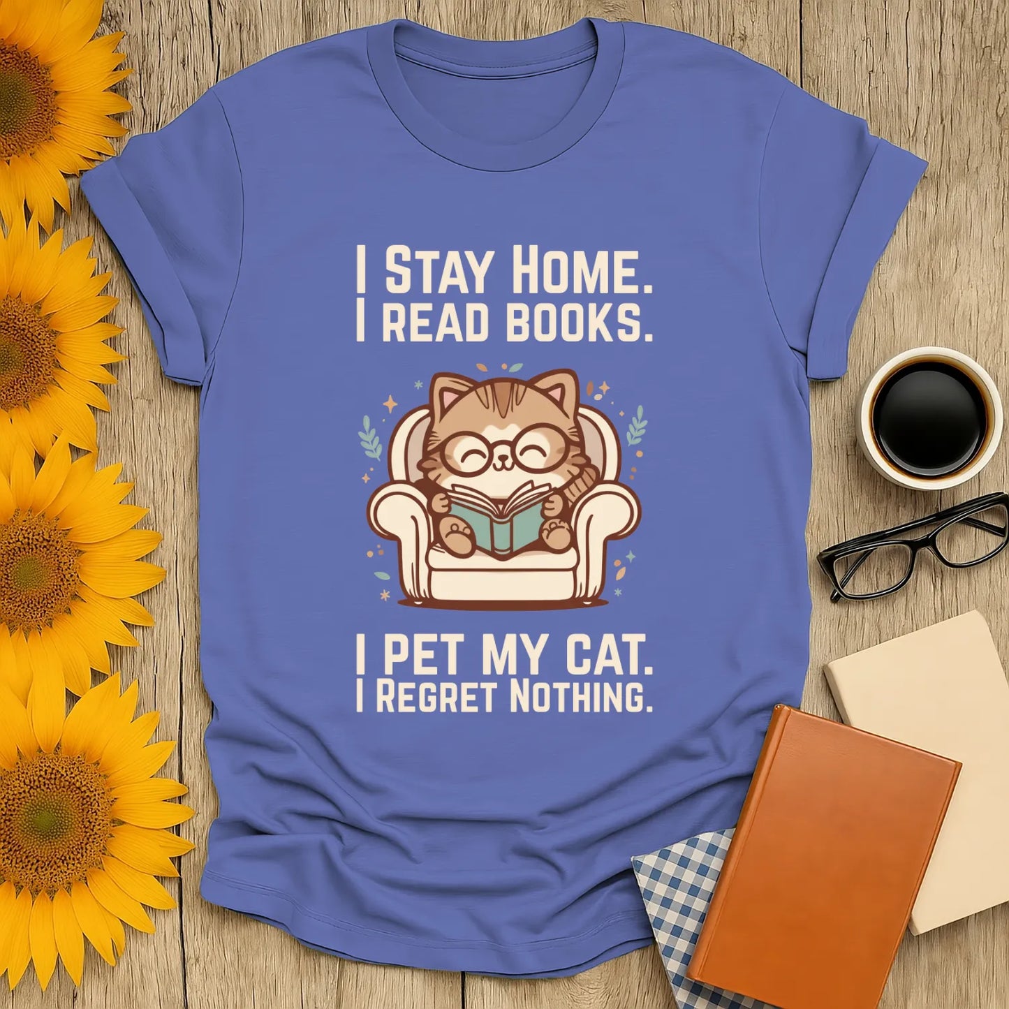 Homebody Cat Reader T-Shirt with a cute cat in glasses reading a book, humorously stating, 'I Stay Home. I Read Books. I Pet My Cat. I Regret Nothing.'