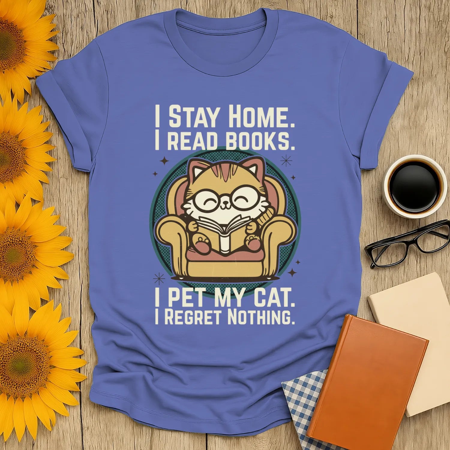 Retro Cat Reader T-Shirt featuring a cat in glasses reading on a cozy armchair, perfect for book lovers who enjoy cats, coffee, and humor.