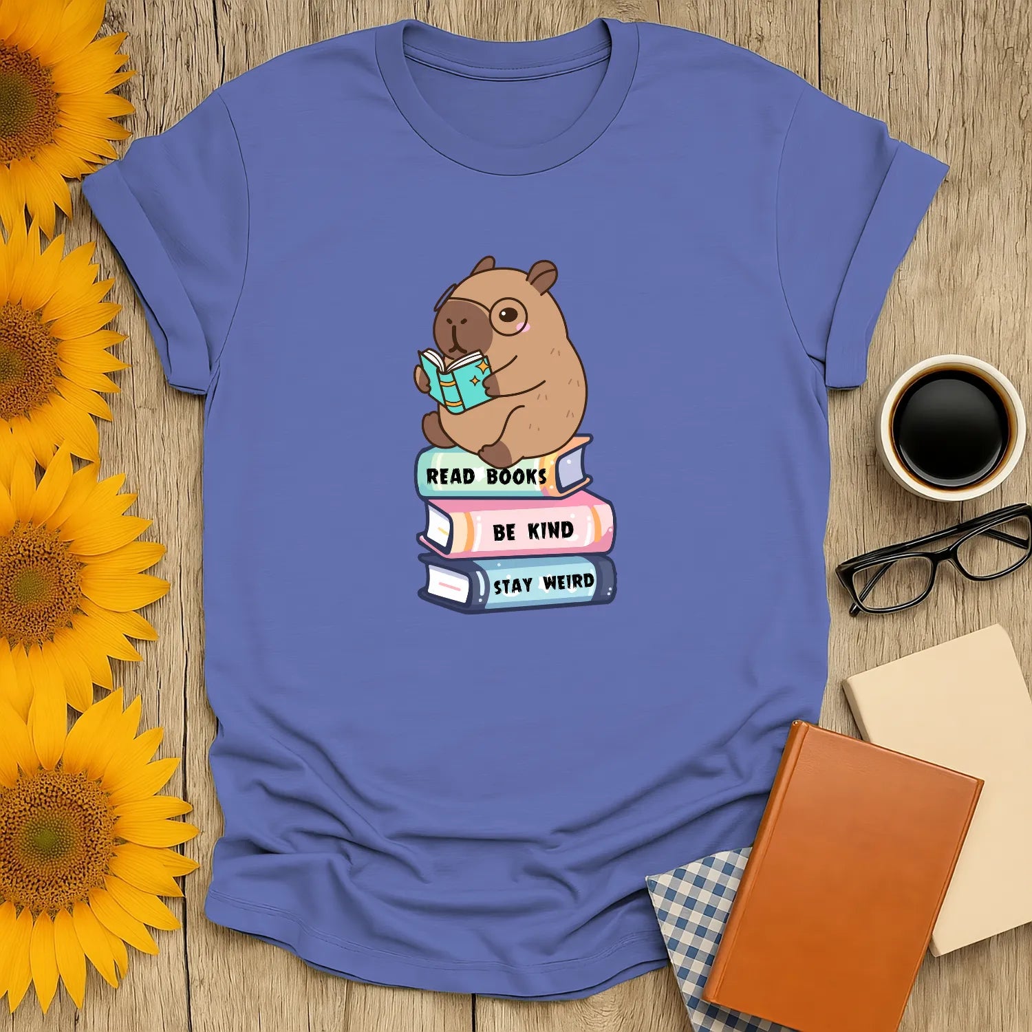 Capybara Reader T-Shirt featuring an adorable capybara on book stack, relaxed fit unisex tee, ideal for book lovers 📖.