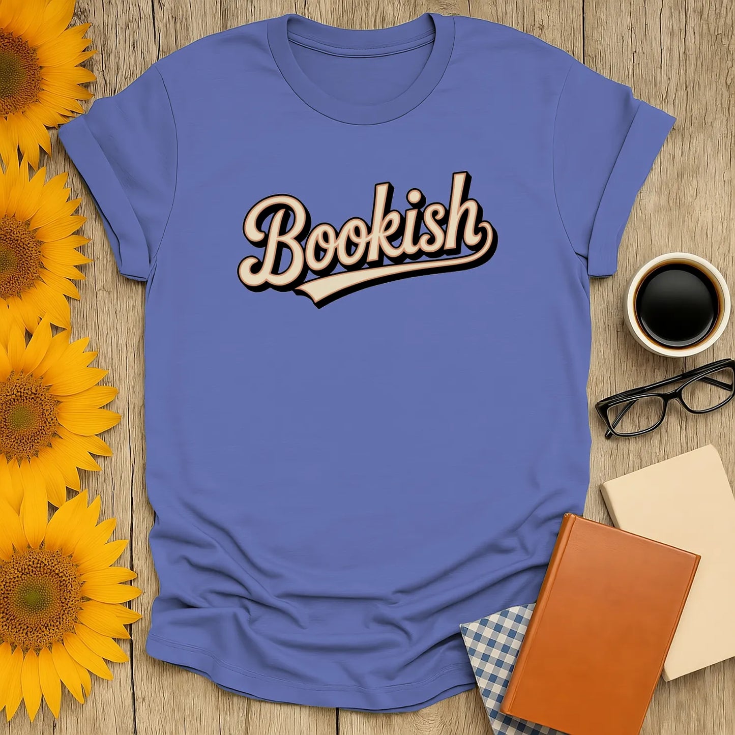 Cute blue unisex t-shirt with 'Bookish' text, perfect gift for book lovers, coffee or tea enthusiasts.