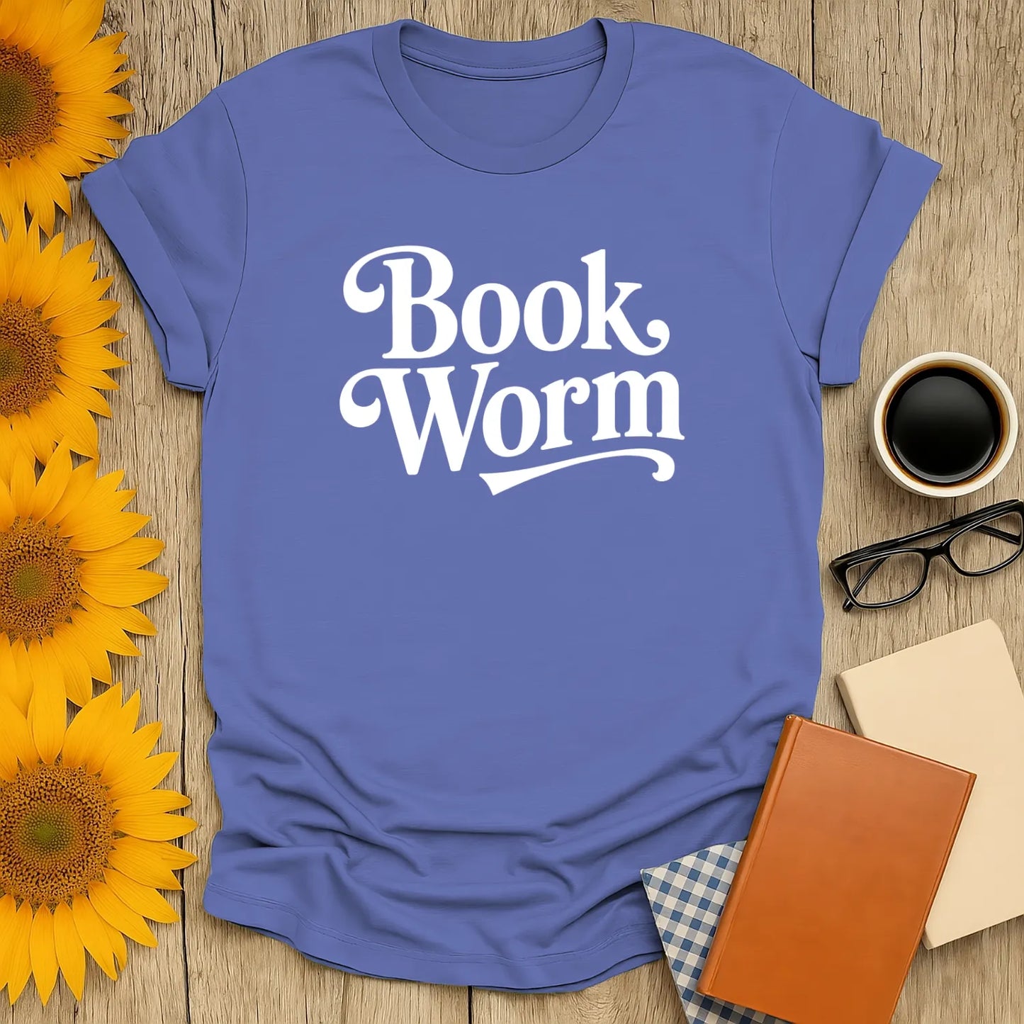 Bookworm Minimal T-Shirt in soft blue with stylish 'Book Worm' text; perfect gift for cozy readers and cat lovers.