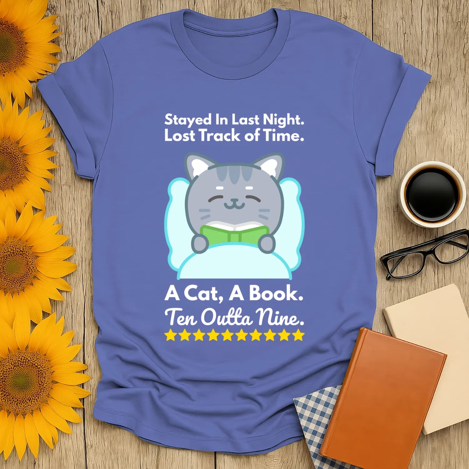 Funny reading tee featuring a cute cat with a book, ideal for book lovers who enjoy coffee or tea.