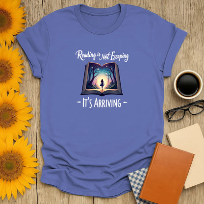 Reading is Arrival T-Shirt featuring glowing book design, relaxed fit unisex, perfect for readers and introverts 📖.
