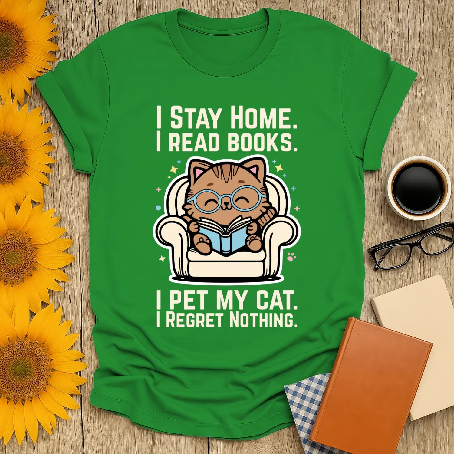 Starry Cat Reader T-Shirt featuring a cute cat in glasses reading at home with bookish humor, perfect for cat-loving bookworms.