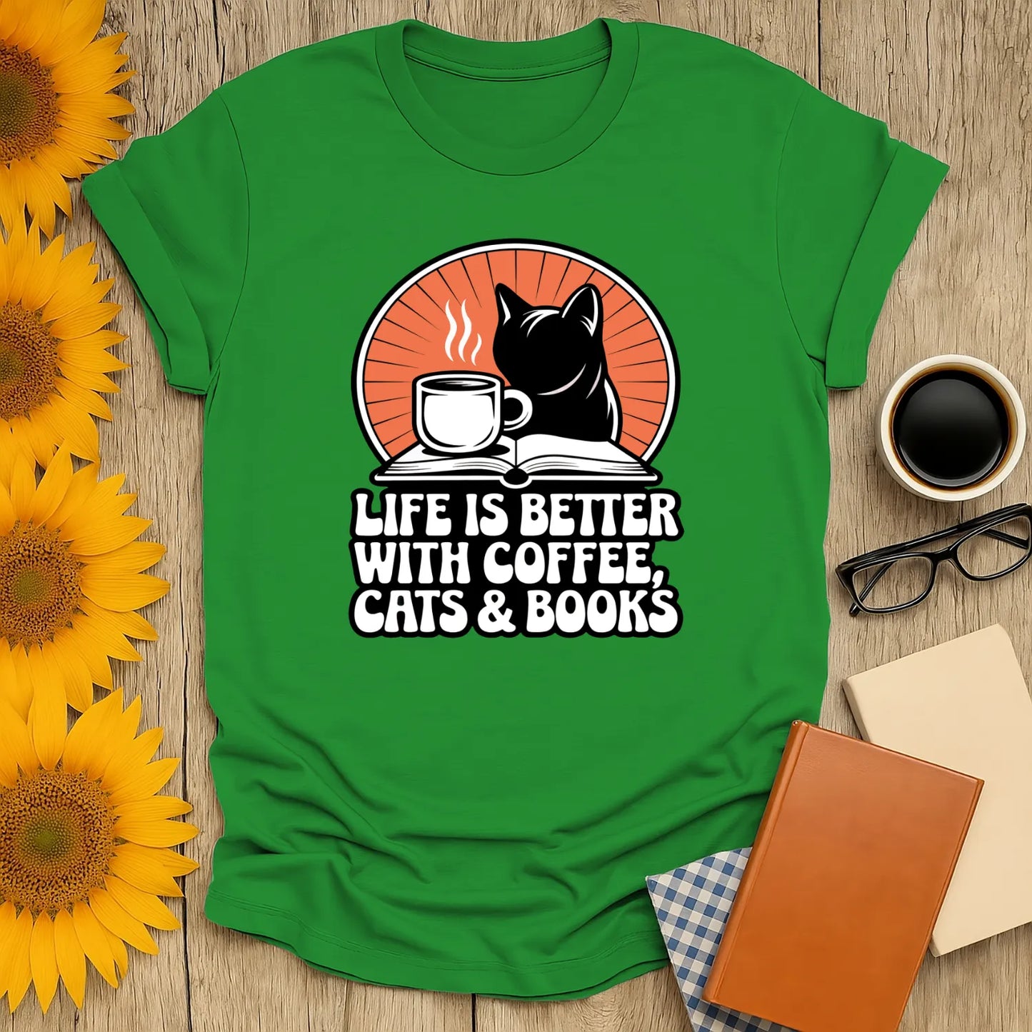 Funny reading tee with black cat, coffee cup, and text: 'Life is Better with Coffee, Cats & Books'. Perfect gift for cozy book lovers!