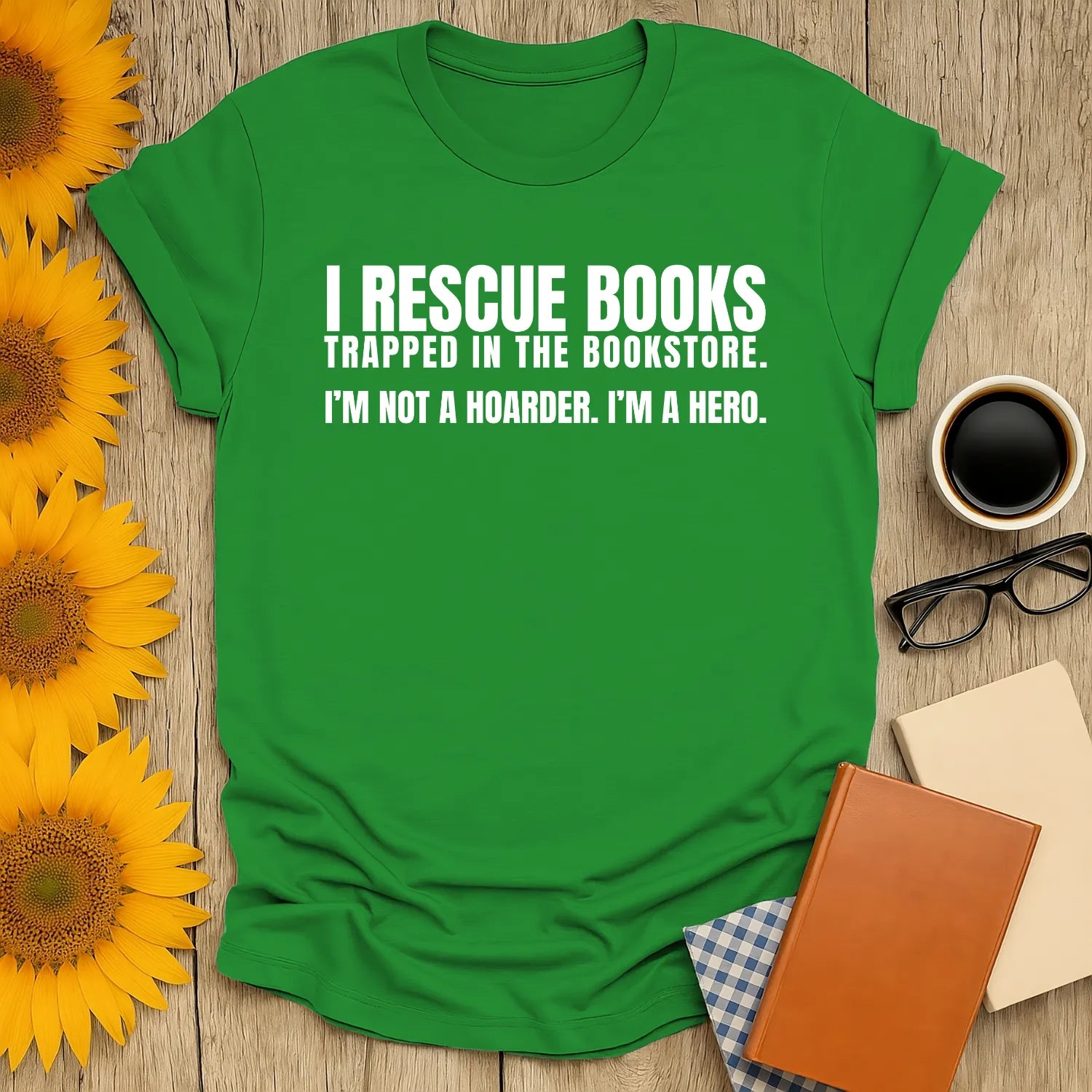 Funny green book lover shirt saying "I Rescue Books, I'm Not a Hoarder, I'm a Hero"—a cozy tee for cat and coffee fans.