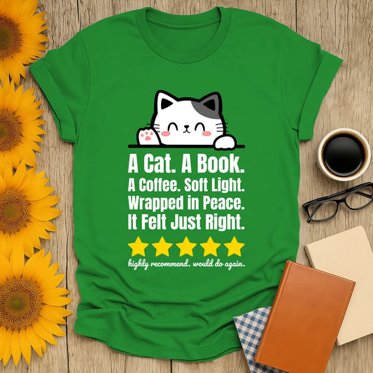 Cozy green t-shirt with a cute cat illustration and text: 'A Cat. A Book. A Coffee. Soft Light. Wrapped in Peace.' Perfect gift for book lovers.