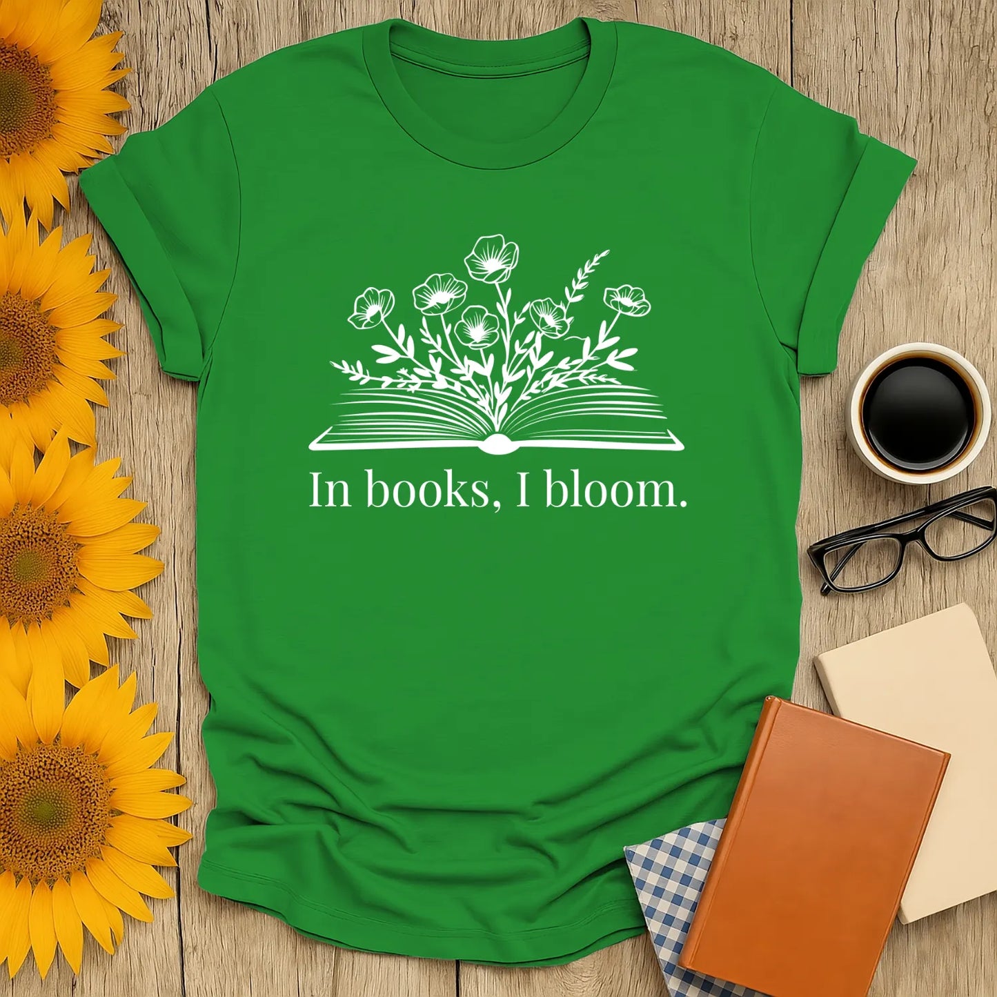Cozy green book lover shirt with flowers and "In books, I bloom" text—perfect gift for readers who adore cats, coffee, or tea.