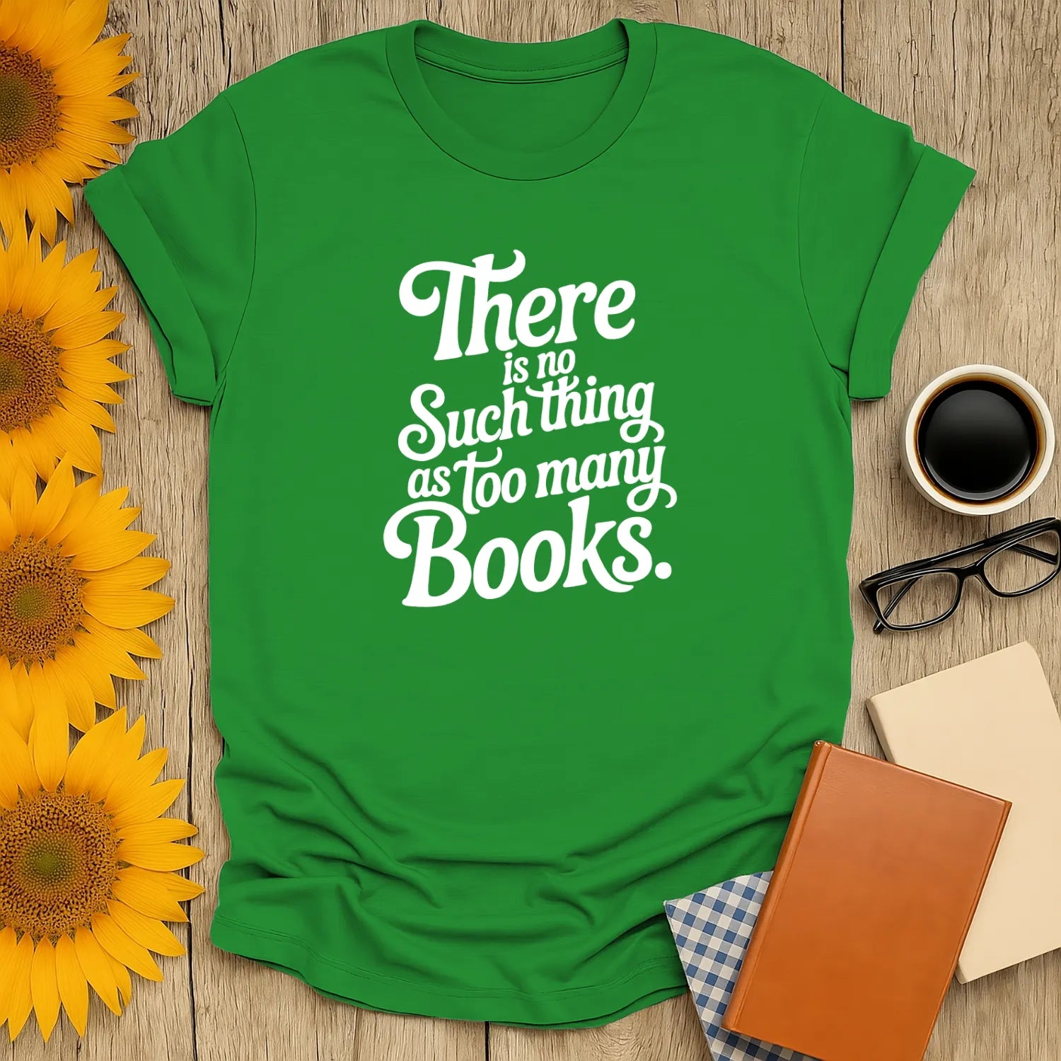 Bright green t-shirt with the text 'There is no Such Thing as too many Books', perfect gift for book lovers, cat readers, and coffee fans.
