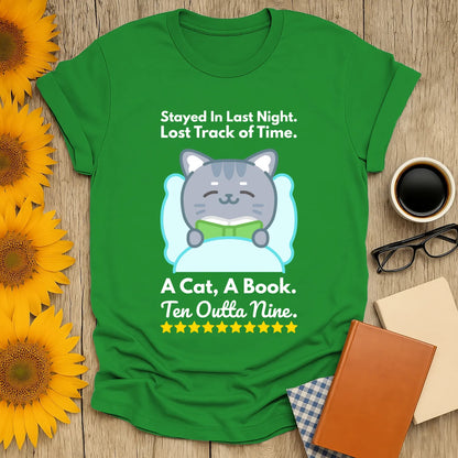 Funny reading tee featuring a cozy cat with a book and the phrase 'A Cat, A Book, Ten Outta Nine'—perfect for book lovers!