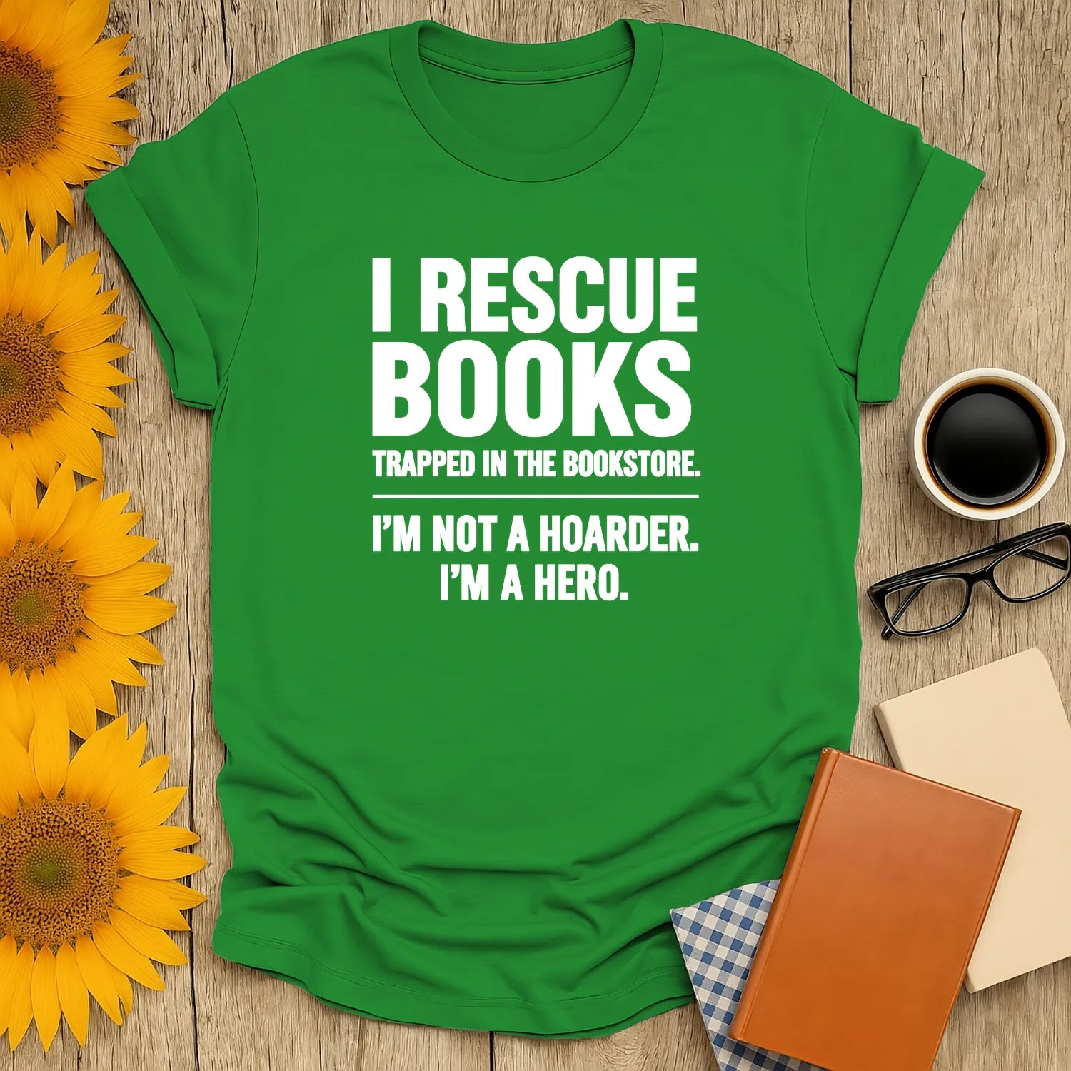 Bright green 'I Rescue Books, I'm Not a Hoarder, I'm a Hero' shirt—perfect gift for book lovers who enjoy cozy reads with cats or coffee.
