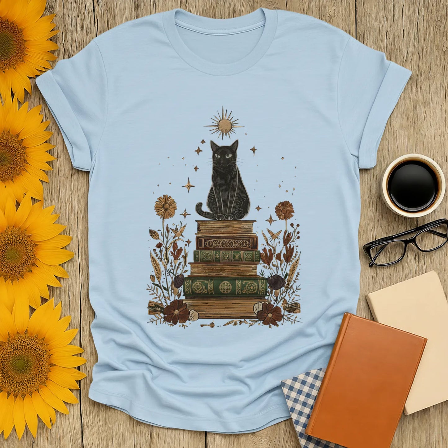 Mystic Cat & Books T-Shirt featuring a whimsical black cat on vintage books, perfect for cozy book lovers and gift giving.