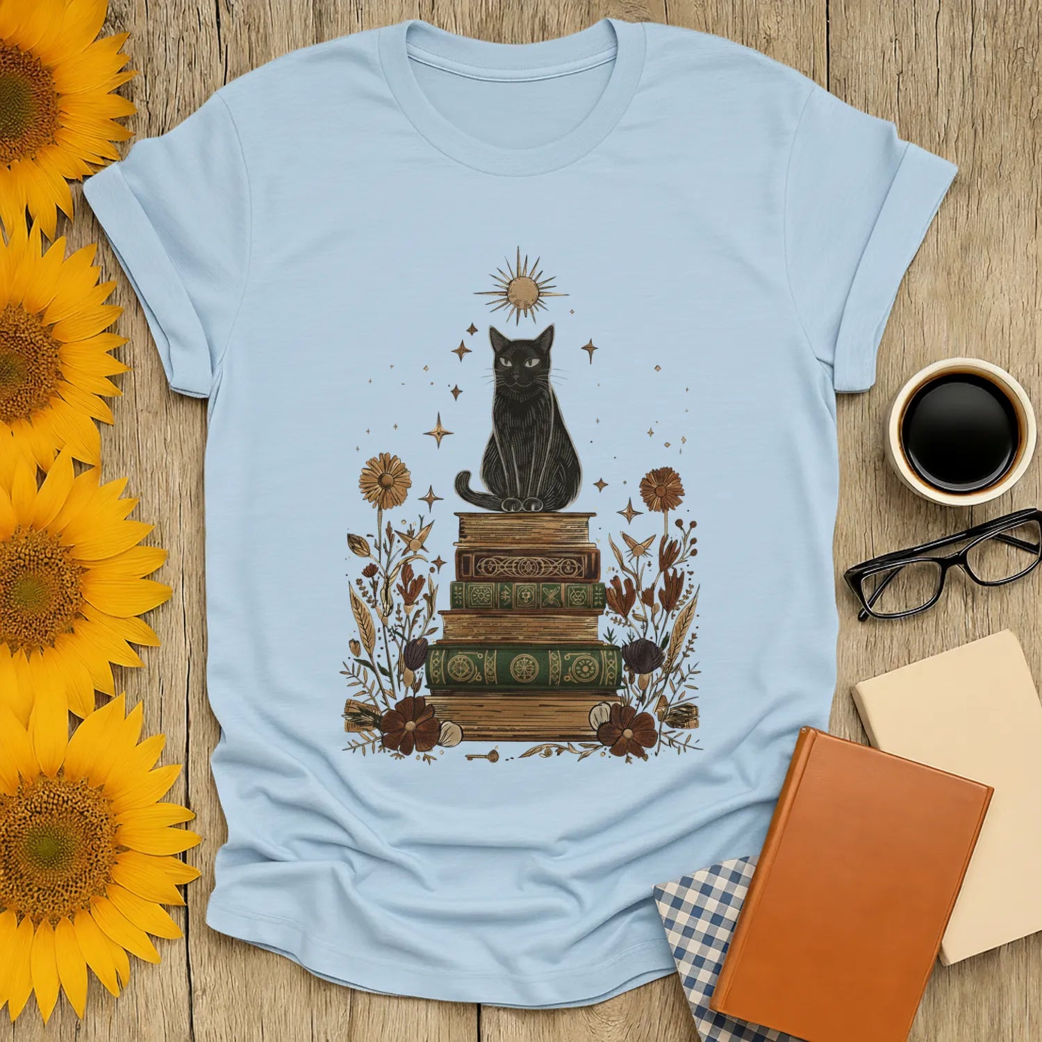 Mystic Cat & Books T-Shirt featuring a whimsical black cat on vintage books, perfect for cozy book lovers and gift giving.