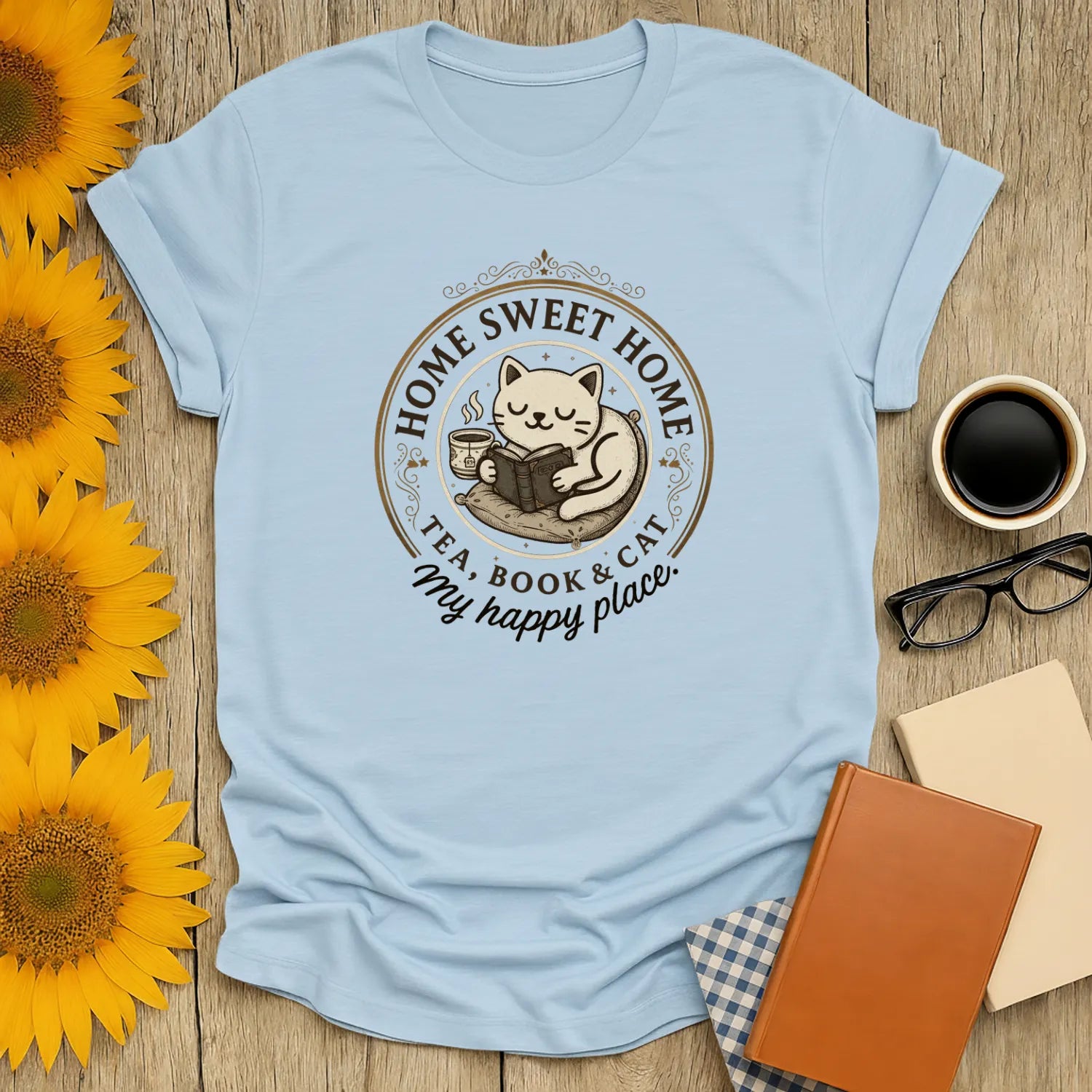 Happy Place Reader T-Shirt with a cozy cat illustration, text about home, perfect gift for book lovers and cat enthusiasts.