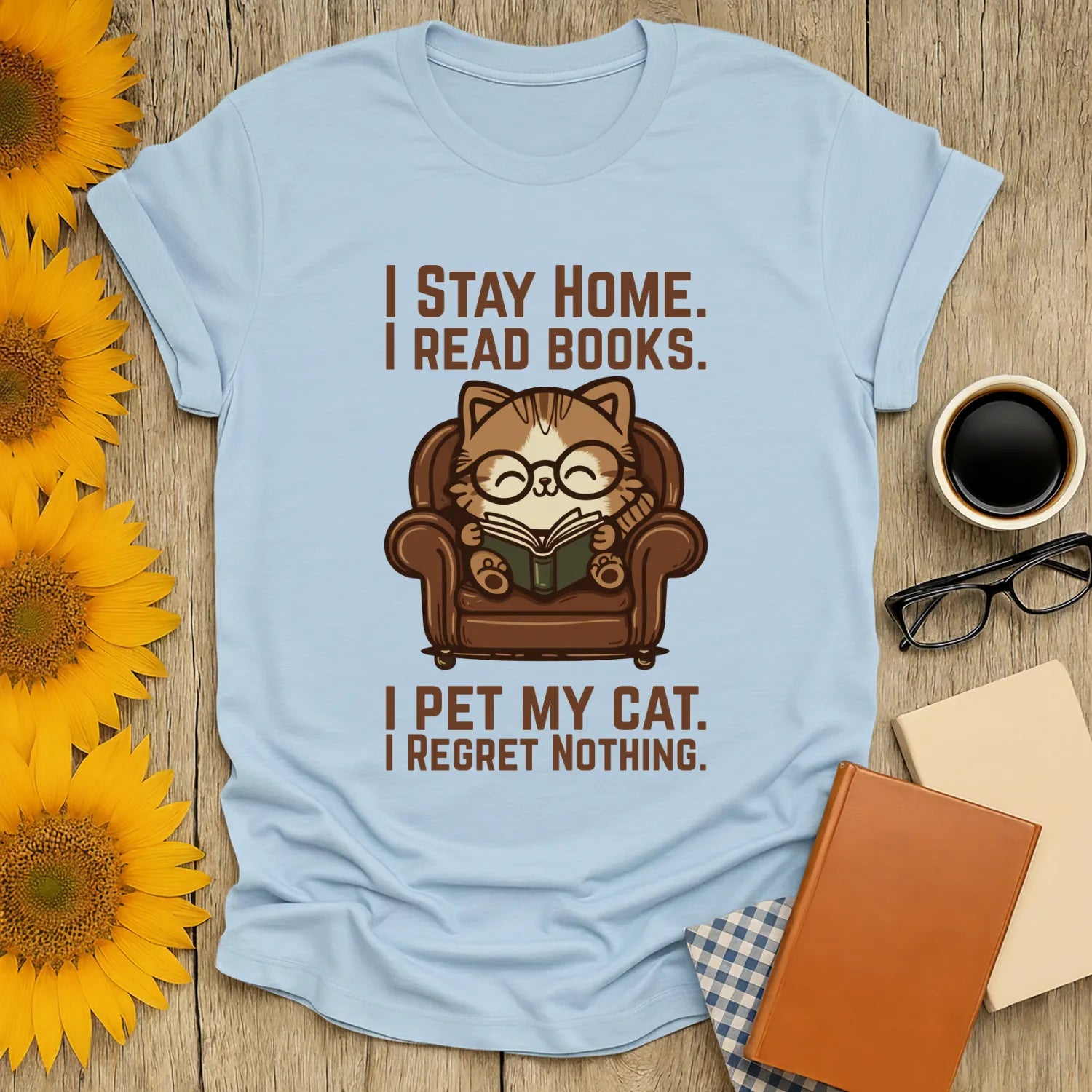 Armchair Cat Reader T-Shirt with a cozy cat in glasses, text about reading books and enjoying pets, perfect gift for book lovers.