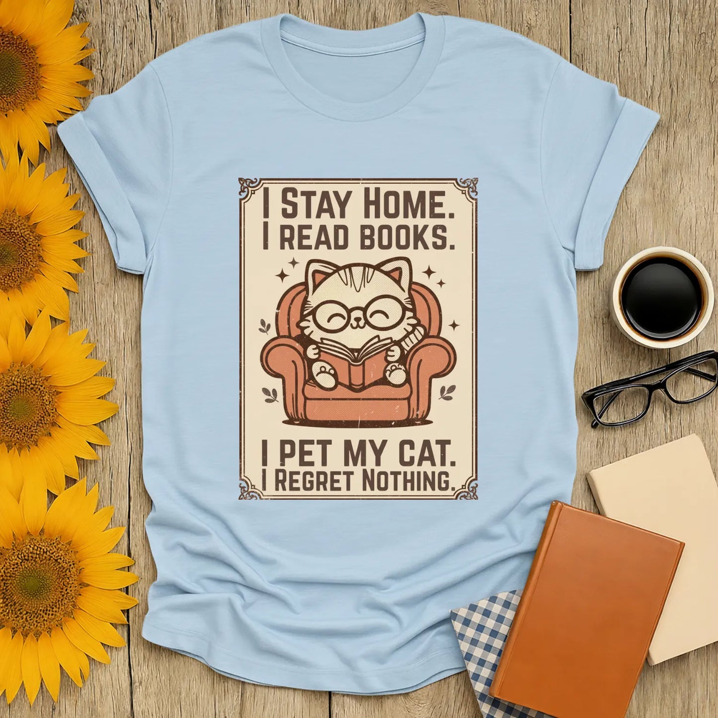 Poster Cat Reader T-Shirt featuring a cute cat in glasses reading, with text: 'I Stay Home. I Read Books. I Pet My Cat. Regret Nothing.' Perfect for book lovers.