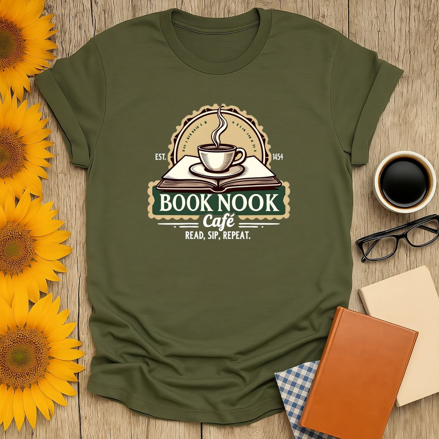 Book Nook Vibes T-shirt featuring coffee, a book, and the phrase 'Read, Sip, Repeat'—a cozy gift for book lovers.