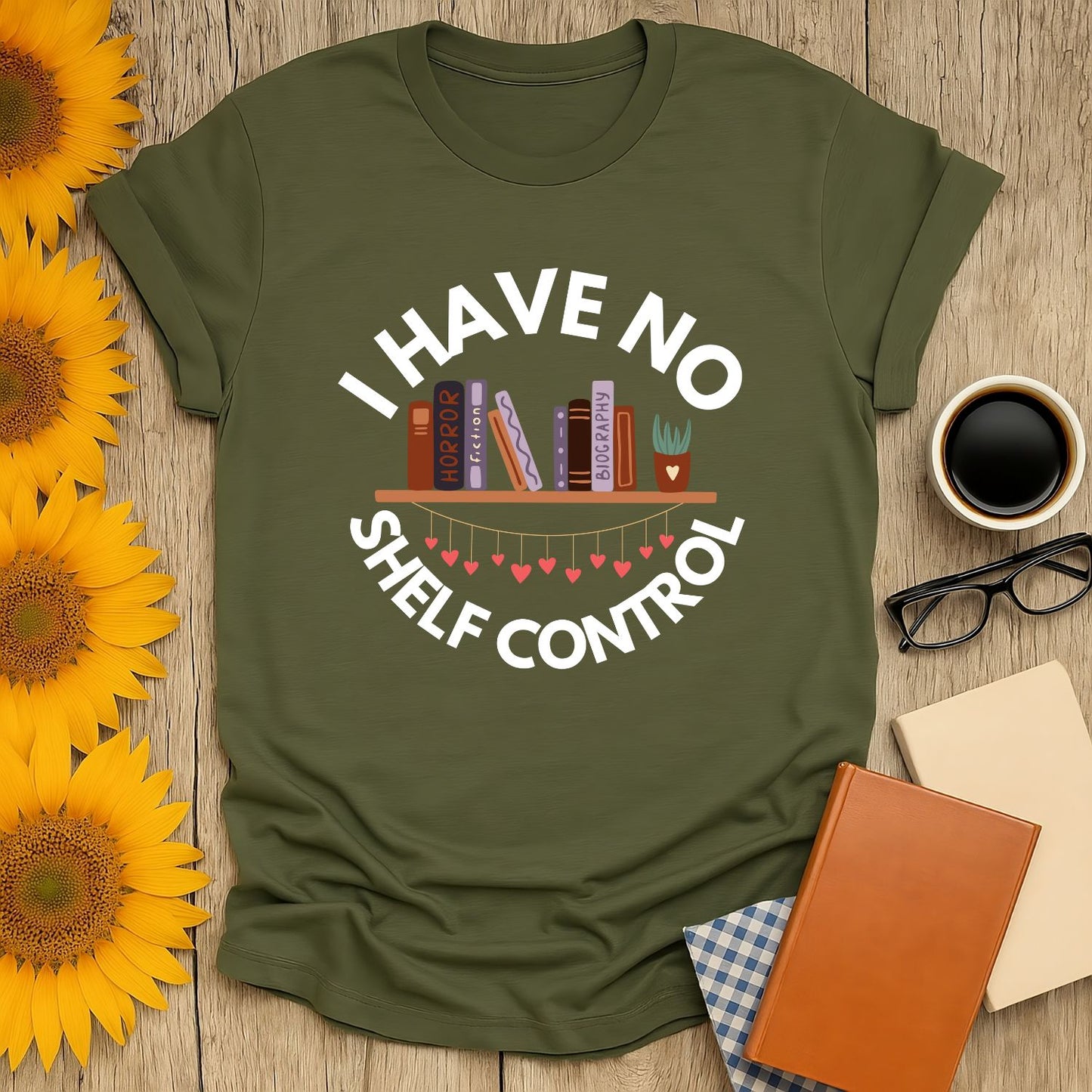 Cozy 'I Have No Shelf Control' T-shirt with playful book stack design, perfect gift for cat and book lovers.