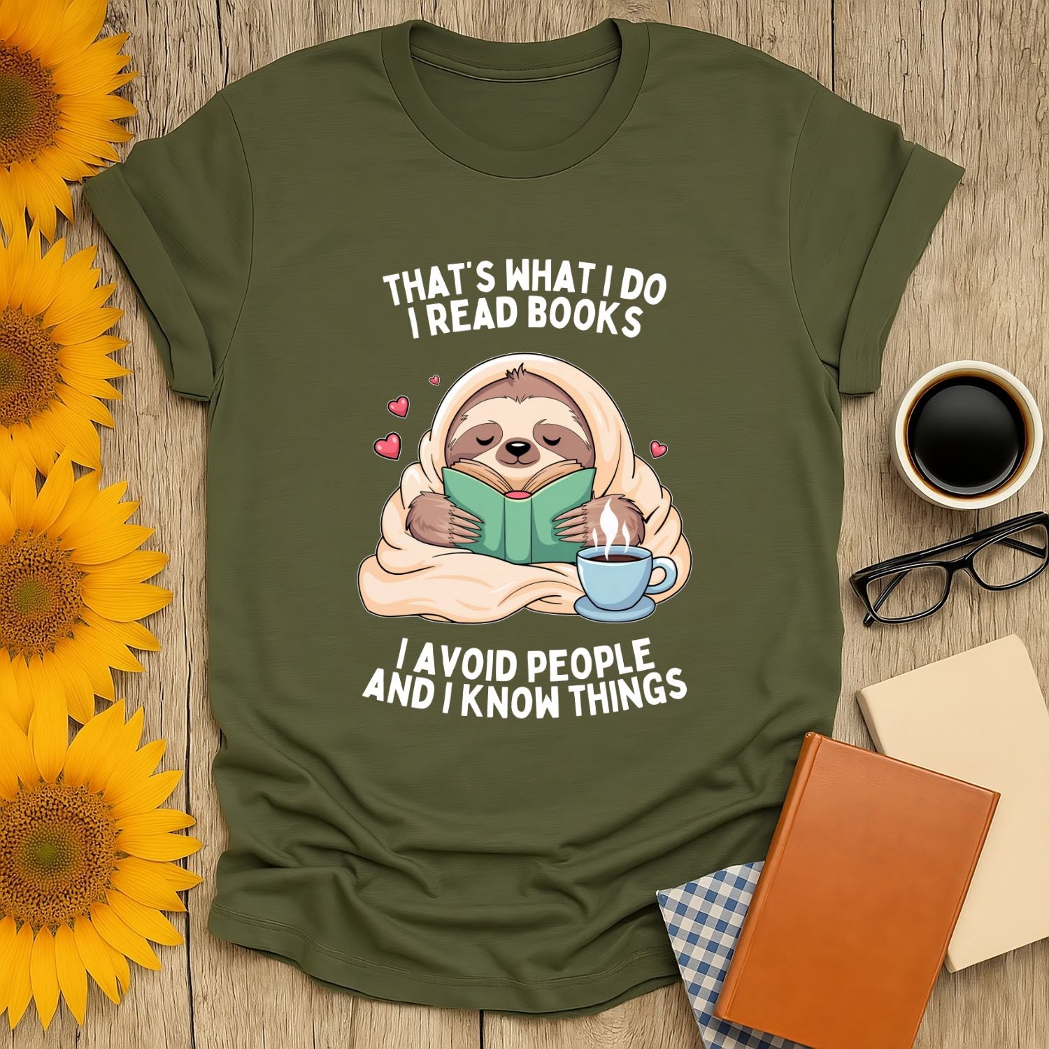 Sloth reading a book on a t-shirt with the phrase "I avoid people and I know things," perfect for book lovers.