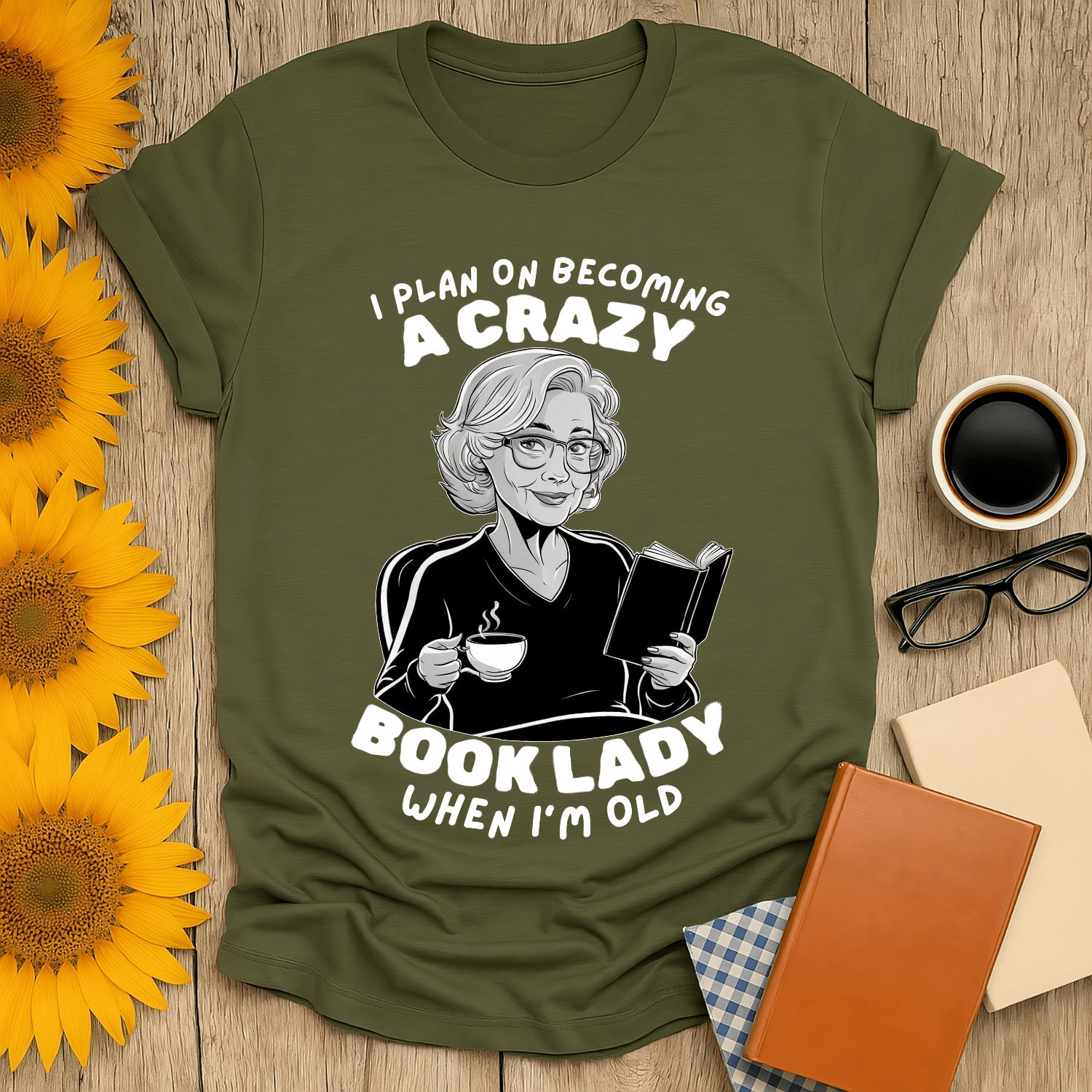Crazy Book Lady t-shirt for book lovers, featuring a cheerful design with a woman reading and sipping coffee.