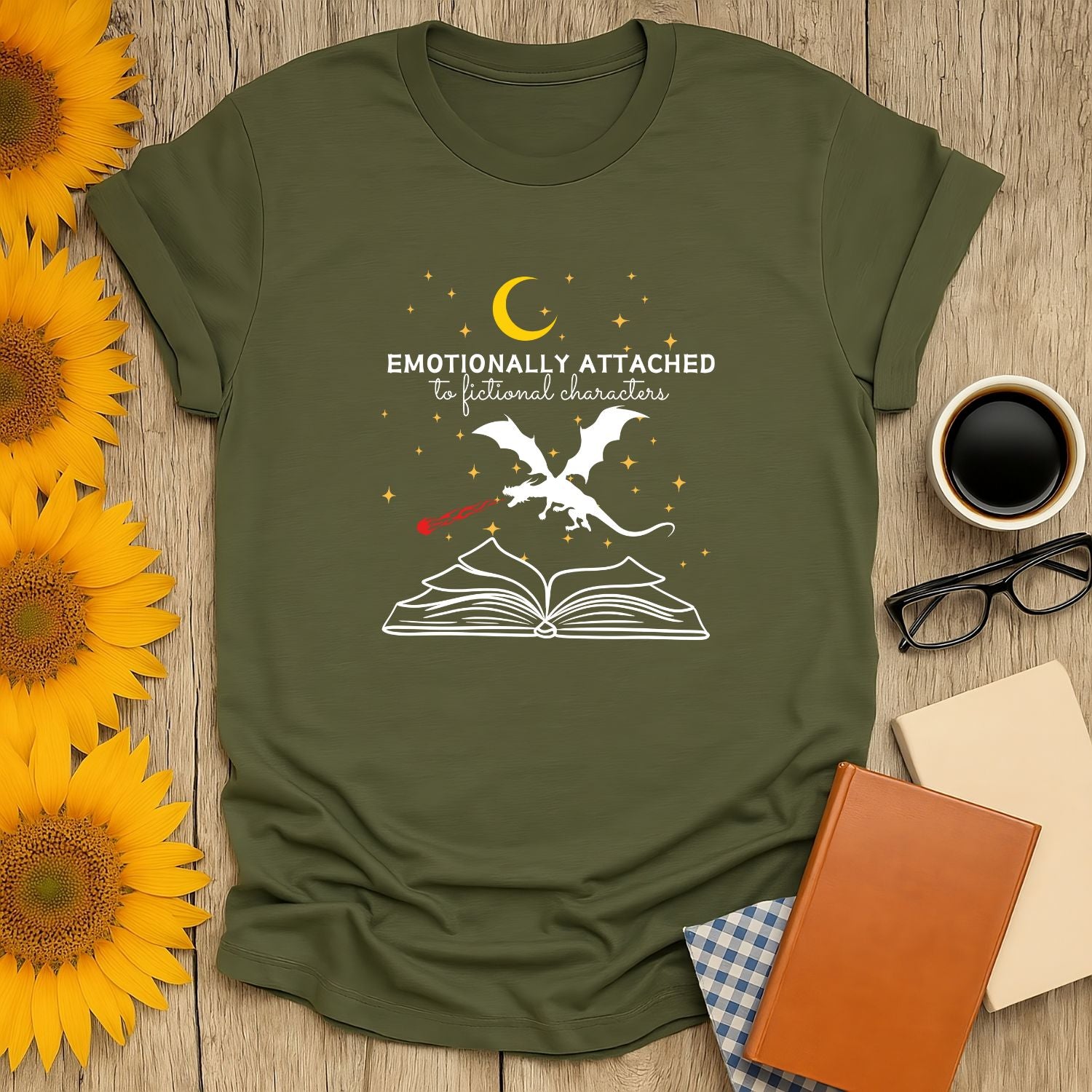 Book lover shirt featuring a dragon and open book with 'Emotionally Attached to Fictional Characters' text, perfect for cozy readers.