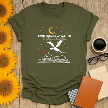 Book lover shirt featuring a dragon and open book with 'Emotionally Attached to Fictional Characters' text, perfect for cozy readers.