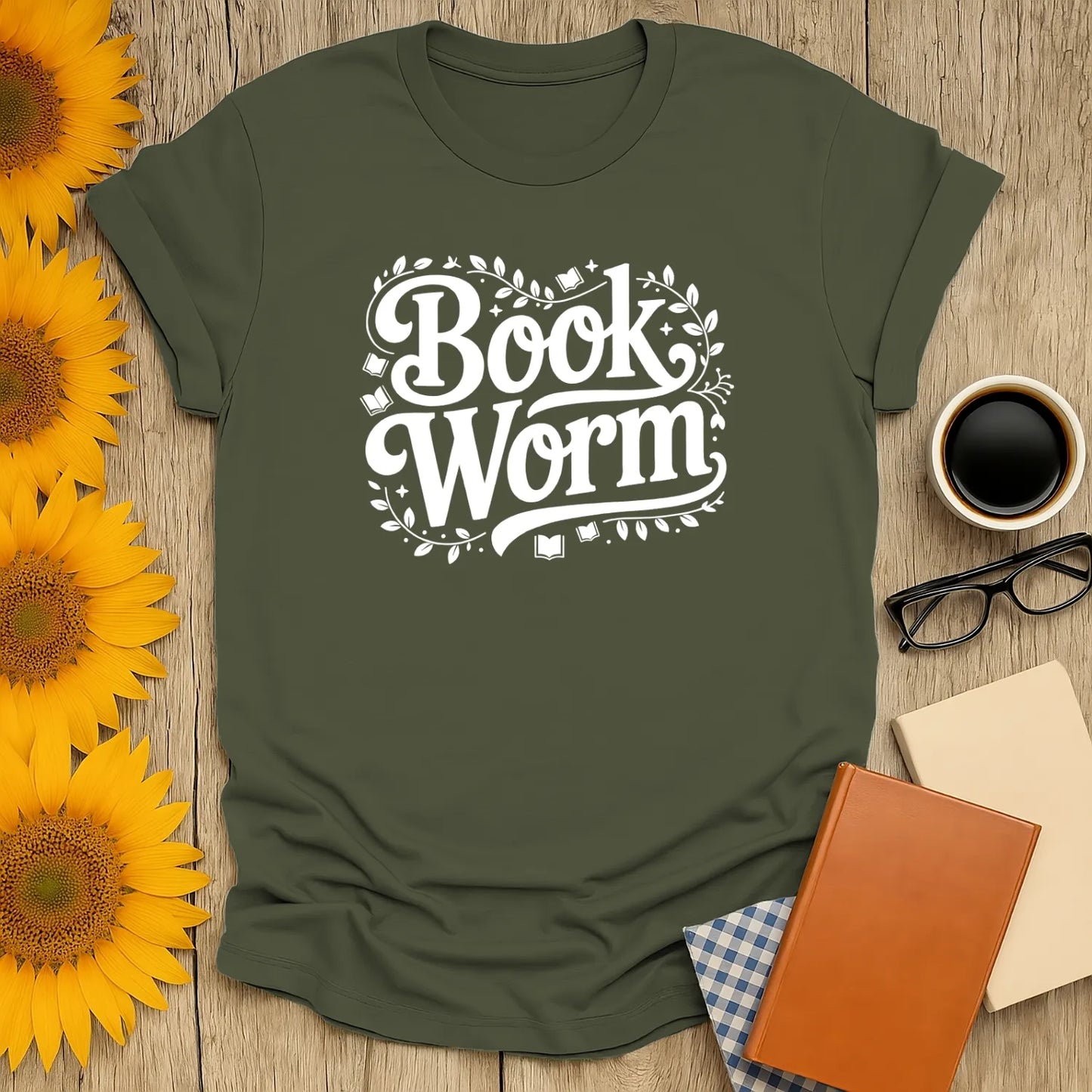 Cozy Bookworm Magic T-Shirt with whimsical 'Book Worm' design, perfect gift for coffee and cat-loving readers.